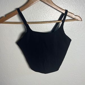 Black crop length sports bra